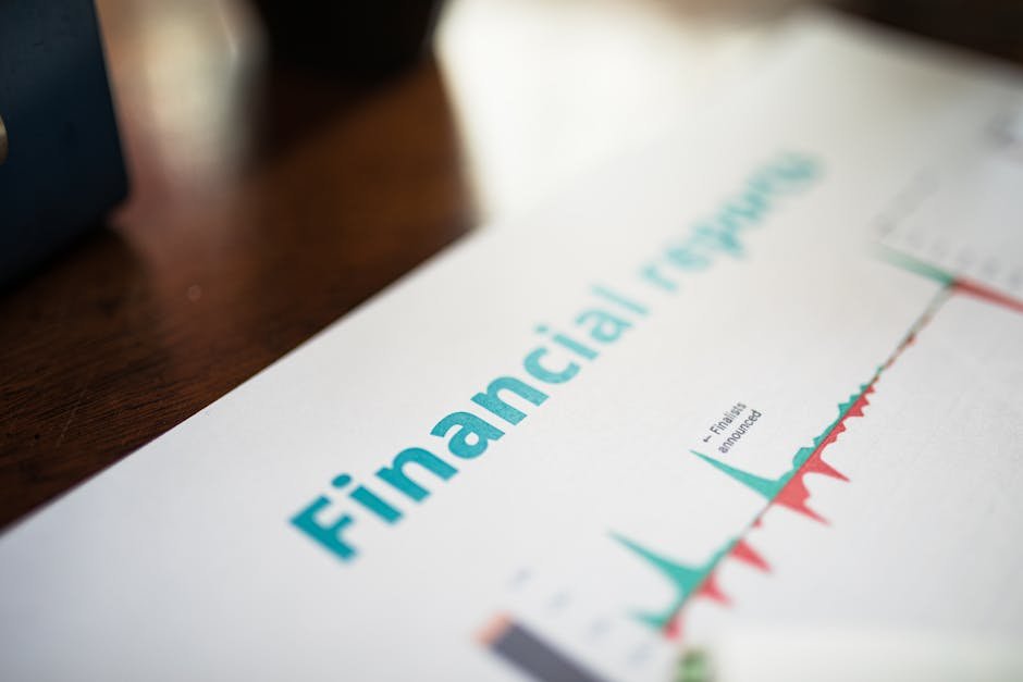 Financial documents under review showing graphs and data analysis