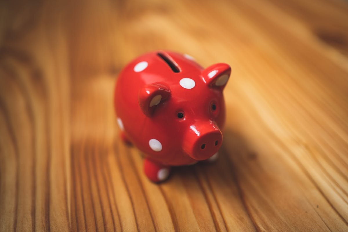 Treasury bills and savings account comparison with stacked coins